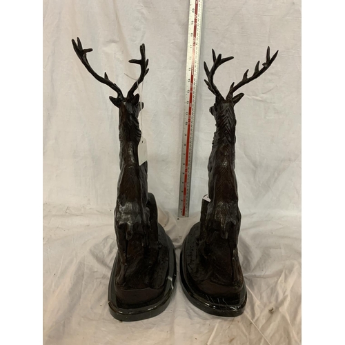 165 - A PAIR OF IMPRESSIVE BRONZE STAGS ON MARBLE BASES APPROXIMATELY 42CM HIGH