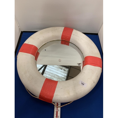 186 - A LIFEGUARD RING FRAMED MIRROR