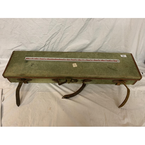 191 - A GREEN CANVAS GUN CASE WITH LEATHER STRAPS (HANDLE A/F)