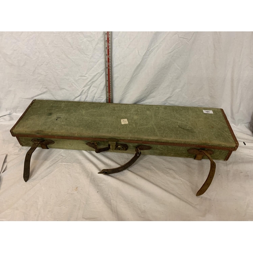 191 - A GREEN CANVAS GUN CASE WITH LEATHER STRAPS (HANDLE A/F)