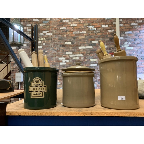 194 - A COLLECTION OF BREAD BINS AND VINTAGE ROLLING PINS