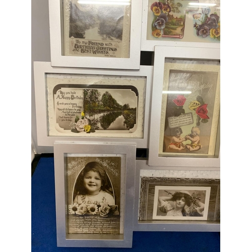 201A - A COLLECTION OF FRAMED POSTCARDS