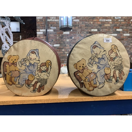 204 - A PAIR OF VINTAGE FOOTSTOOLS DEPICTING ANDY PANDY, LOOPY LOO AND TEDDY