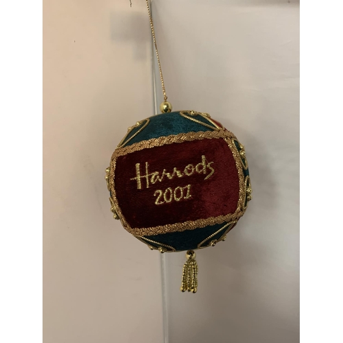 223 - A HARRODS 2001 CHRITMAS BAUBLE IN GREEN AND RED WITH GOLD COLOURED BRAIDING