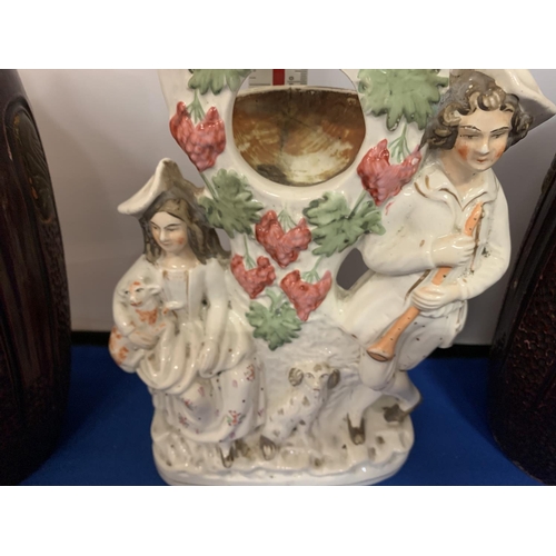 243 - A PAIR OF BRETBY VASES AND A STAFFORDSHIRE CERAMIC FIGURE OF A LADY AND GENT WITH SPANIEL POCKET WAT... 