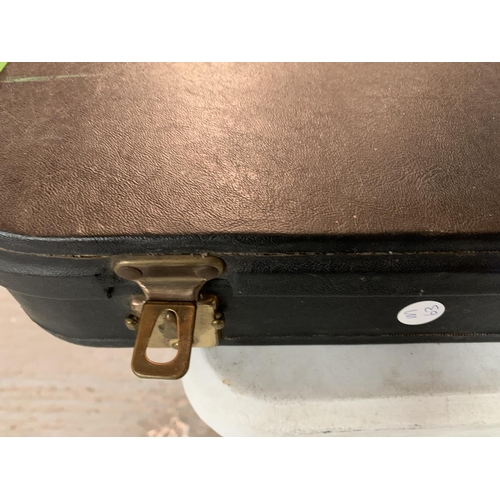 284 - A VINTAGE SHOT GUN CASE