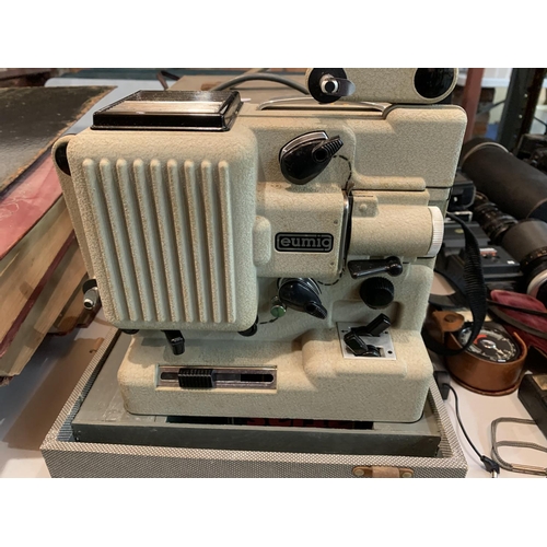 289 - A VINTAGE EUMIG PROJECTOR WITH CASE