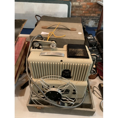 289 - A VINTAGE EUMIG PROJECTOR WITH CASE