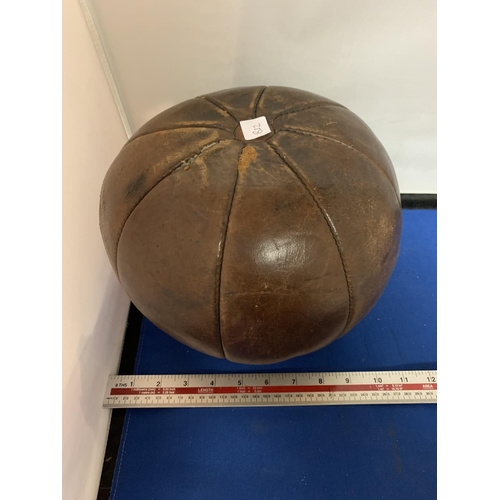 294 - A VINTAGE HEAVY LEATHER MEDICINE BALL