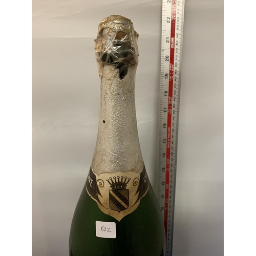 295 - A LARGE CHAMPAGNE BOTTLE