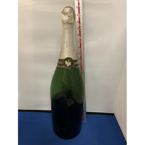 295 - A LARGE CHAMPAGNE BOTTLE