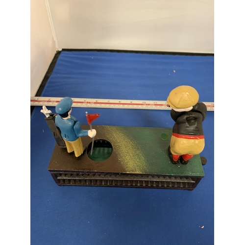 296 - A MECHANICAL CAST IRON GOLFER'S MONEY BOX