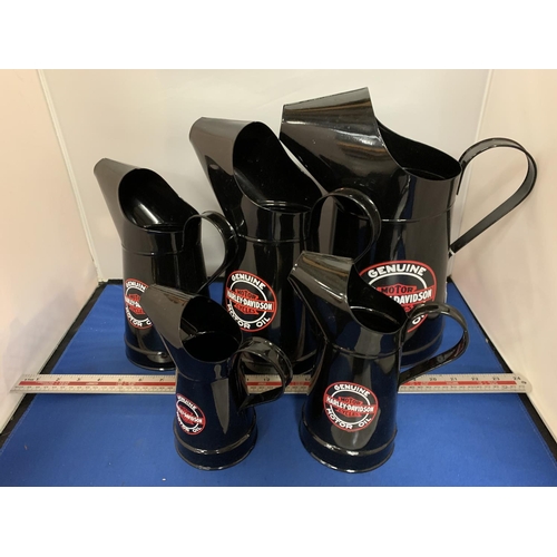 443 - FIVE GRADUATED HARLEY DAVIDSON OIL JUGS