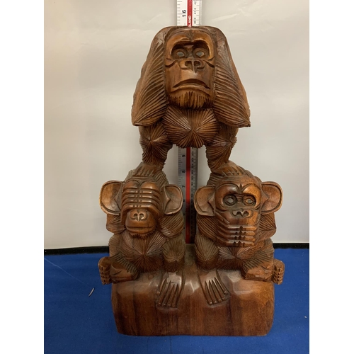 446 - A LARGE WOODEN MONKEY CARVING ' SEE NO EVIL, SPEAK NO EVIL, HEAR NO EVIL'