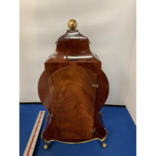 486 - A MAHOGANY AND GILT MANTLE CLOCK