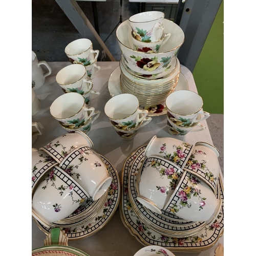 496 - A LARGE COLLECTION OF CHINA CUPS AND SAUCERS AND A LOLSOL ART DECO STYLE SERVING DISH