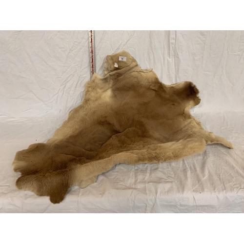 56 - A GOAT SKIN RUG