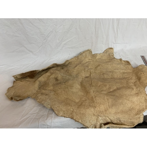 56 - A GOAT SKIN RUG