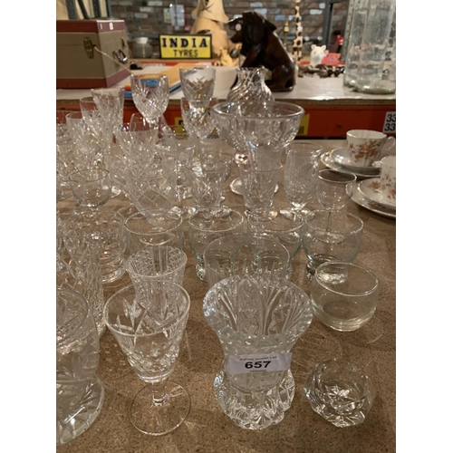 657 - A LARGE COLLECTION OF CUT GLASS TO INCLUDE BOWLS, GLASSES, VASE ETC