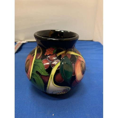 675 - A MOORCROFT 4 INCH QUEEN'S CHOICE VASE