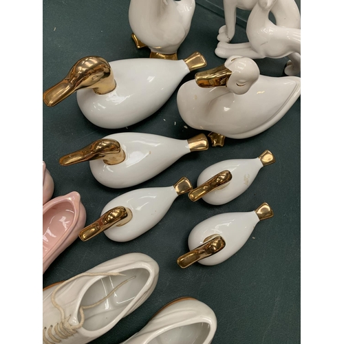 70 - VARIOUS CHINA ITEMS TO INCLUDE SHOES, BALLET FLATS, DUCKS, DOGS ETC