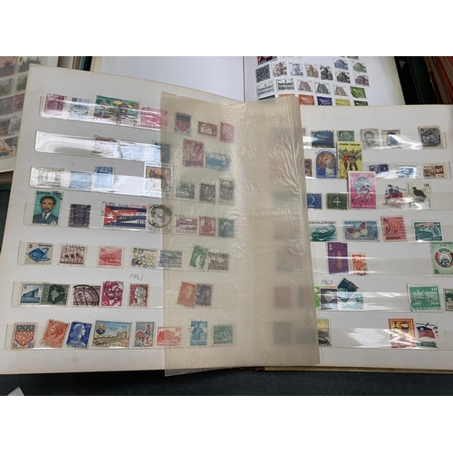 72 - THREE BOOKS CONTAINING VARIOUS STAMPS FROM AROUND THE WORLD