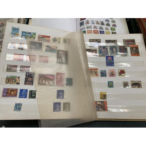 72 - THREE BOOKS CONTAINING VARIOUS STAMPS FROM AROUND THE WORLD