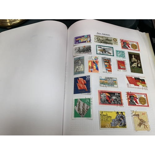 72 - THREE BOOKS CONTAINING VARIOUS STAMPS FROM AROUND THE WORLD