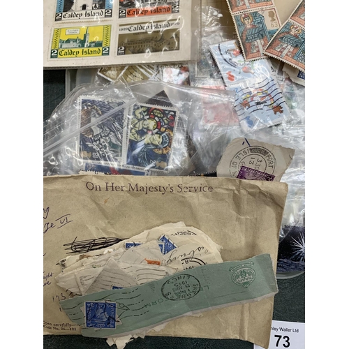 73 - A LARGE QUANTITY OF STAMPS AND ALBUMS FROM AROUND THE WORLD