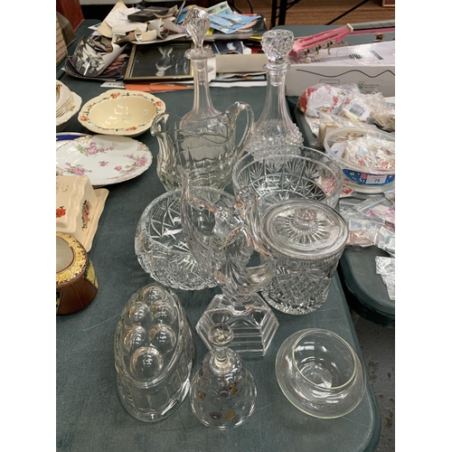 76 - VARIOUS ITEMS OF ORNATE GLASSWARE TO INCLUDE DECANTERS, JARS, FIGURINE, JELLY MOULD ETC