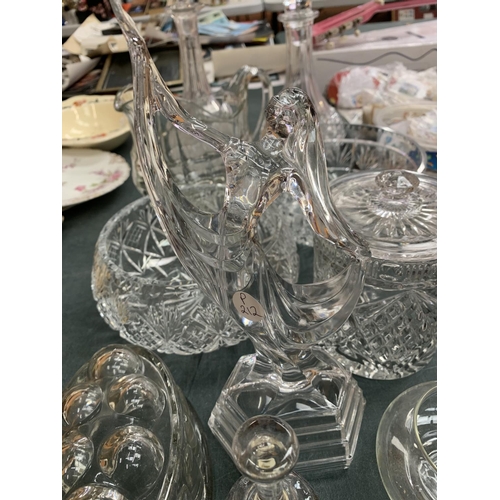 76 - VARIOUS ITEMS OF ORNATE GLASSWARE TO INCLUDE DECANTERS, JARS, FIGURINE, JELLY MOULD ETC