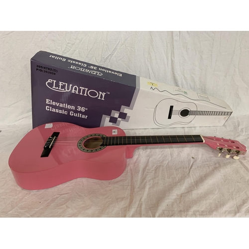 88 - A NEW AND BOXED PINK ELEVATION 36 INCH CLASSIC GUITAR