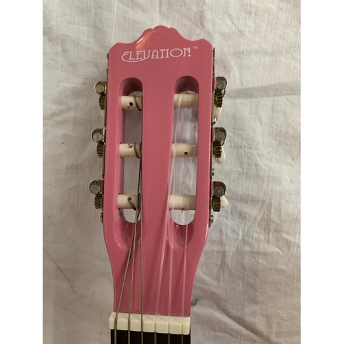 88 - A NEW AND BOXED PINK ELEVATION 36 INCH CLASSIC GUITAR