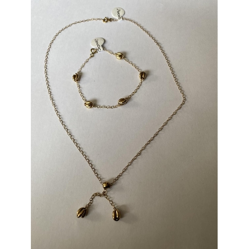 621 - A 9 CARAT YELLOW GOLD NECKLACE (40 CM) AND MATCHING BRACELET - 4.2 GRAMS