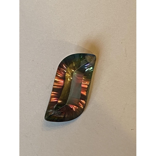 690 - A DRILLED IRIDESCENT STONE PENDANT