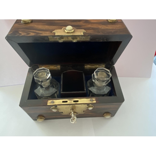 704 - A SMALL COROMANDEL WOOD CHEST CONTAINING TWO GLASS SCENT BOTTLES