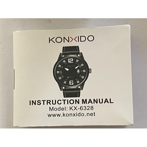 705 - AN AS NEW AND BOXED KONXIDO WRISTWATCH