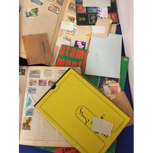 482 - A LARGE QUANTITY OF STAMPS FROM AROUND THE WORLD AND ALBUMS