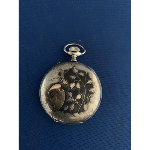 512 - EARLY 20TH CENTURY WHITE METAL SLIM OPEN FACED POCKET WATCH, TOP WINDER WITH EMBOSSED FOLIAGE DECORA... 