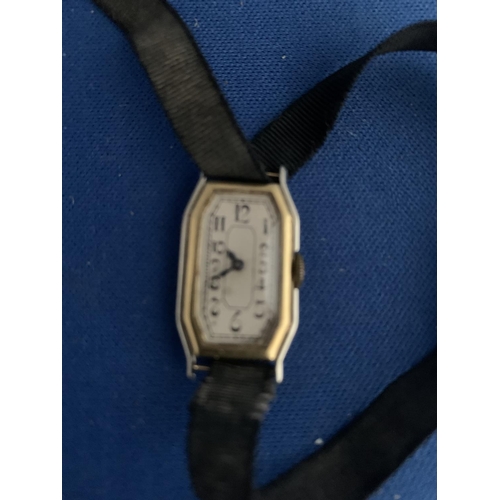 523 - LADIES 18K MARKED LONGINES MANUAL WRIST WATCH WITH BLACK FABRIC STRAP, EARLY 20TH CENTURY, INITIALS ... 