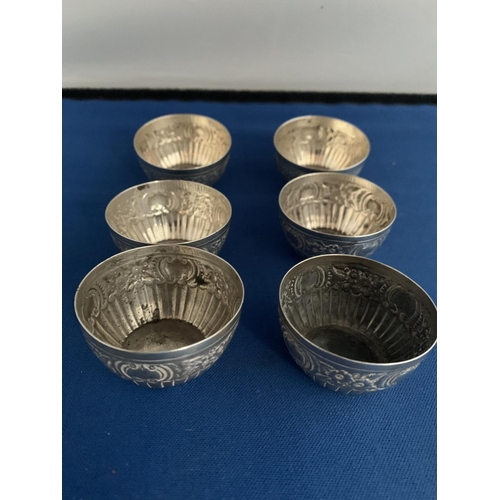 528 - SET OF 6 VICTORIAN SILVER SALT SELLARS WITH EMBOSSED FOLIAGE DECORATION BARKER BROTHERS DATED 1885, ... 