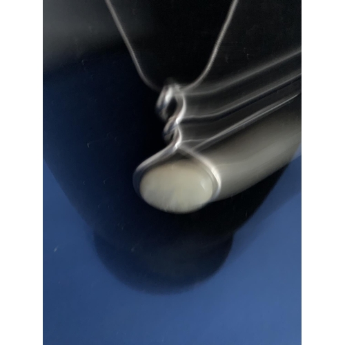 552 - MODERN MOTHER O'PEARL DROP PENDANT AND SNAKE CHAIN AND MATCHING EARRINGS MARKED 925 SILVER