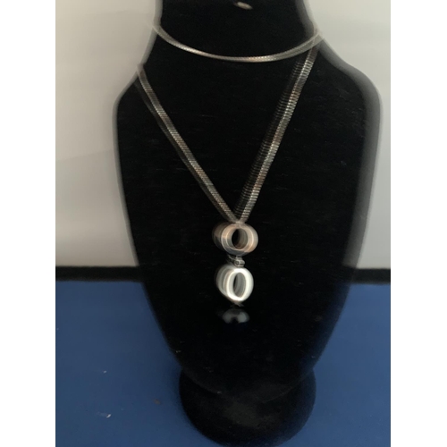 555 - MODERN BLACK STONE FANCY DROP PENDANT AND CHAIN