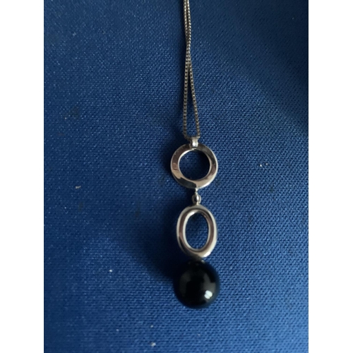 555 - MODERN BLACK STONE FANCY DROP PENDANT AND CHAIN