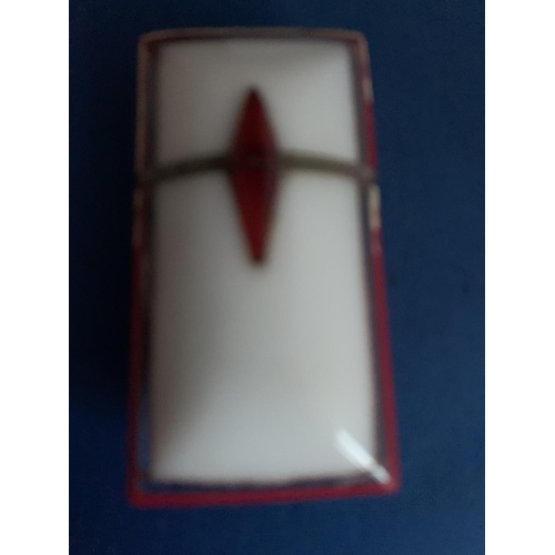 561 - ART DECO RESIN/BAKELITE POCKET PETROL LIGHTER WHITE WITH RED EDGING WITH A CENTRALISED RED DIAMOND L... 