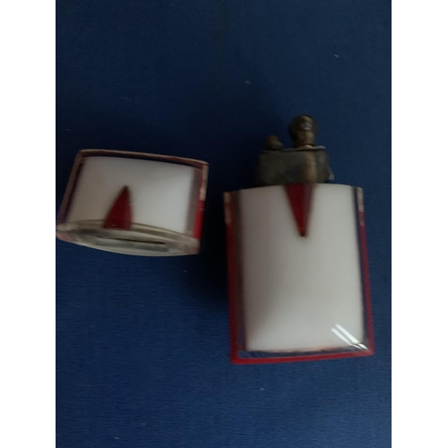 561 - ART DECO RESIN/BAKELITE POCKET PETROL LIGHTER WHITE WITH RED EDGING WITH A CENTRALISED RED DIAMOND L... 