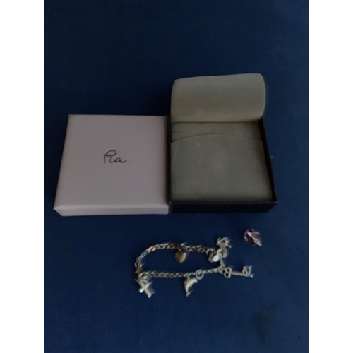 565 - FINE SILVER CHARM BRACELET WITH 7 CHARMS BOXED