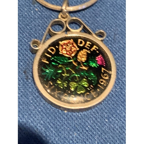 571 - 1967 ENAMELLED MOUNTED SIX PENCE PENDANT AND CHAIN