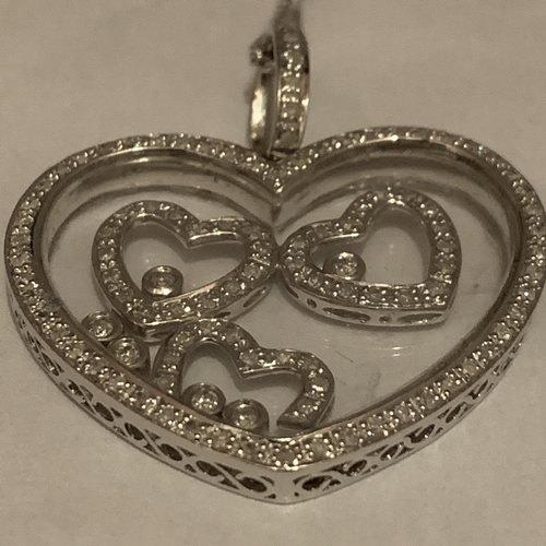 613 - 9CT HALLMARKED WHITE GOLD DIAMOND SET FLOATING HEART PENDANT & FINE CURB CHAIN. TOTAL GROSS WEIGHT 1... 