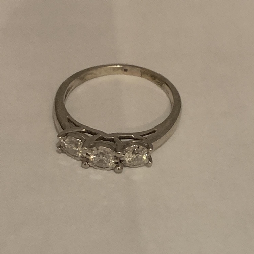 614 - 9CT HALLMARKED WHITE GOLD DIAMOND TRILOGY RING ILLUSION SET. TOTAL GROSS WEIGHT 3 GRAMS